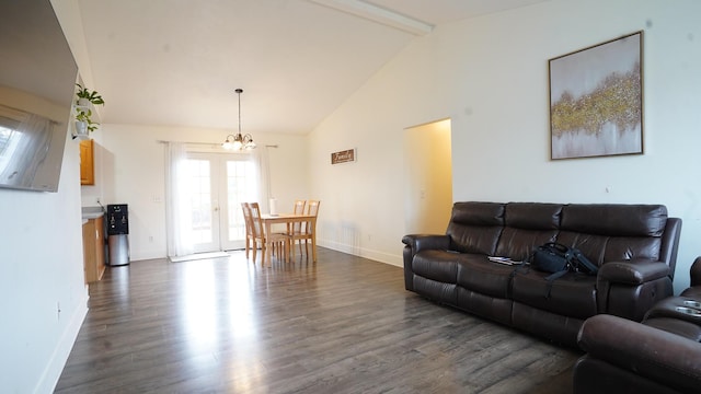 living area with a chandelier, high vaulted ceiling, dark wood-type flooring, baseboards, and beamed ceiling