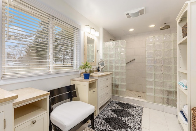 full bath with a walk in shower, recessed lighting, vanity, visible vents, and tile patterned floors