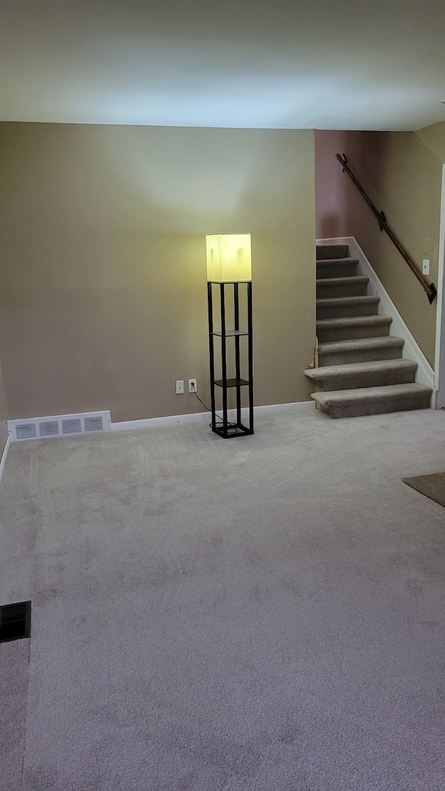 22273 Collette St, Woodhaven, MI 48183 - interior space featuring stairs, visible vents, baseboards, and carpet floors