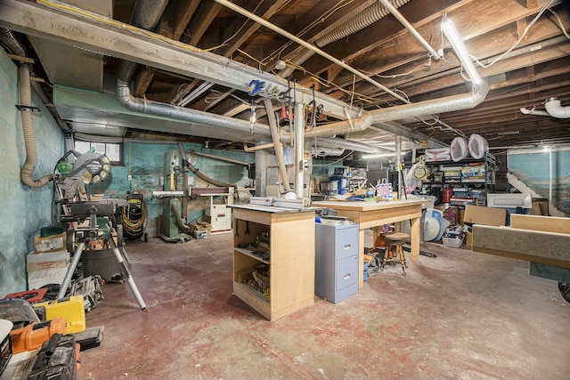 basement with a workshop area