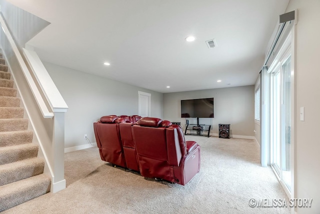 cinema room featuring light carpet, baseboards, visible vents, and recessed lighting