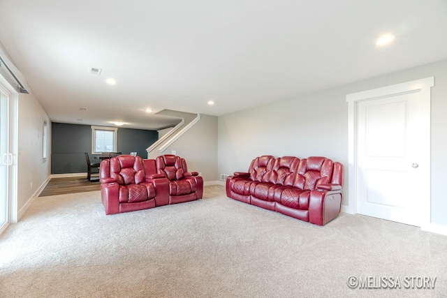 carpeted living room with baseboards and recessed lighting