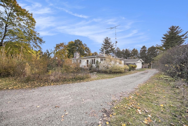 view of street featuring driveway