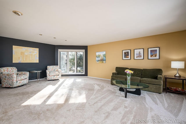 living room with carpet flooring and baseboards