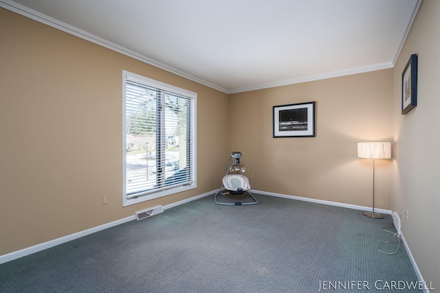 unfurnished room featuring ornamental molding, carpet, visible vents, and baseboards