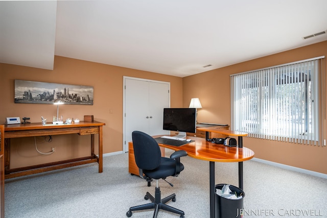 office area with carpet, visible vents, and baseboards