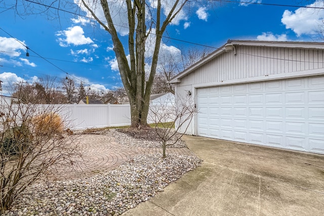 garage with fence