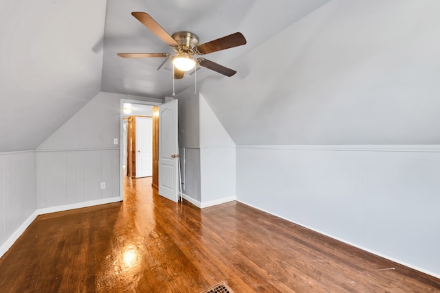 additional living space featuring lofted ceiling, ceiling fan, and wood finished floors