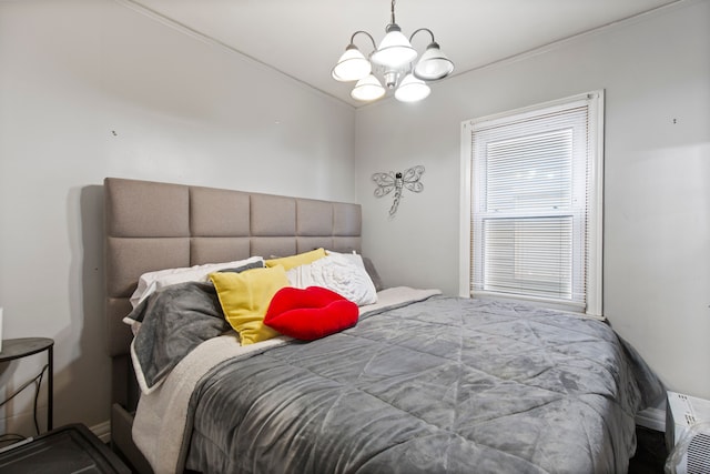 bedroom with a chandelier