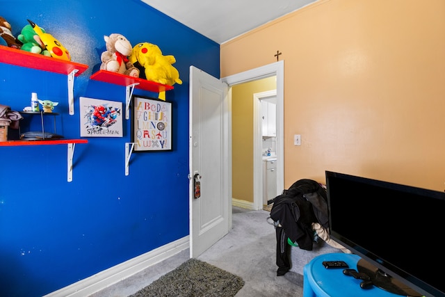playroom featuring carpet and baseboards
