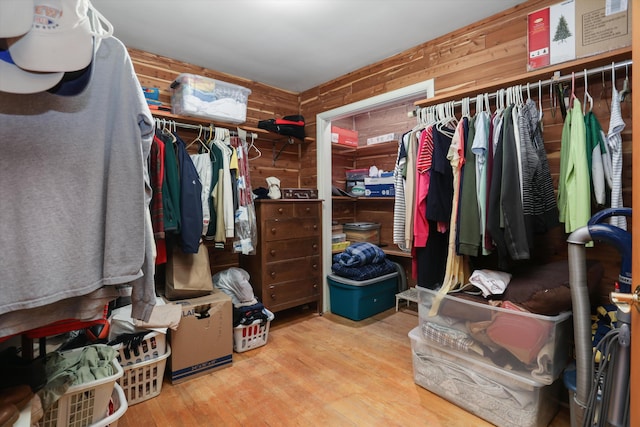 spacious closet featuring wood finished floors