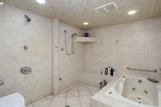 bathroom featuring a whirlpool tub, visible vents, a tile shower, and tile patterned floors