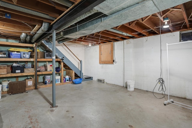 unfinished basement with stairway