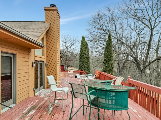 deck featuring outdoor dining space