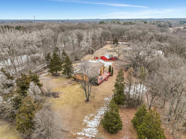 drone / aerial view featuring a forest view and a rural view