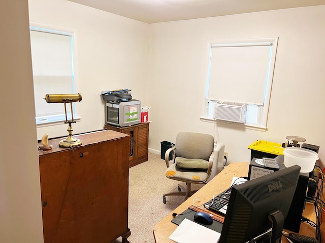 office space with cooling unit, carpet flooring, and baseboards