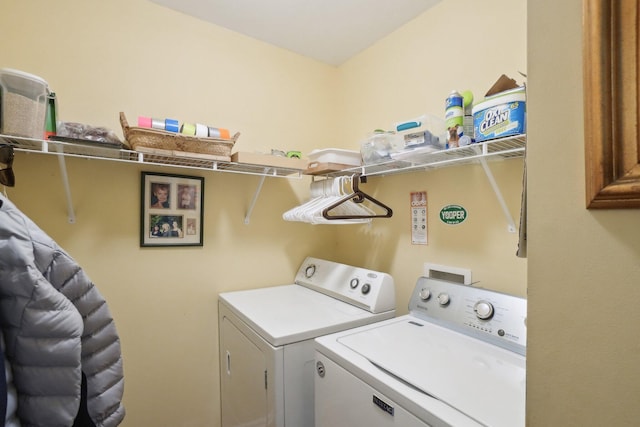 laundry area with separate washer and dryer