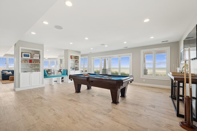 game room featuring light wood-type flooring, plenty of natural light, recessed lighting, and pool table