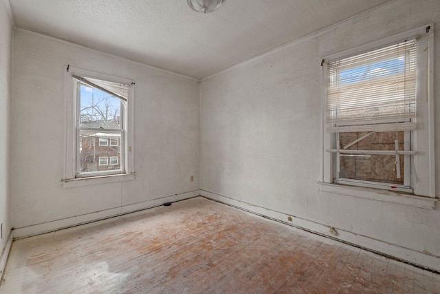 spare room featuring a textured ceiling