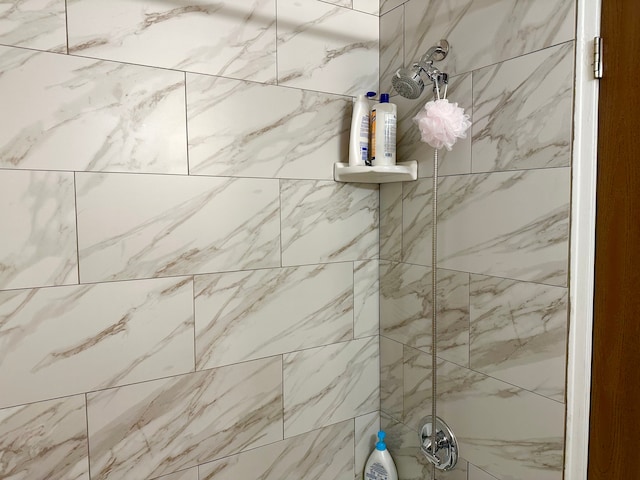 details with a tile shower