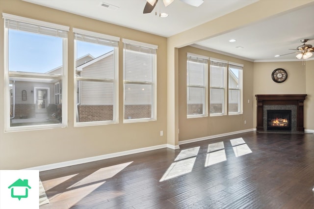 unfurnished living room with visible vents, wood finished floors, recessed lighting, baseboards, and ceiling fan