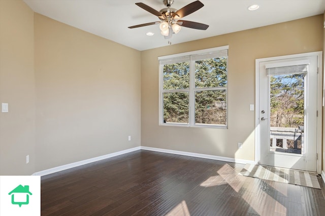 unfurnished room featuring a ceiling fan, recessed lighting, dark wood-style floors, and baseboards