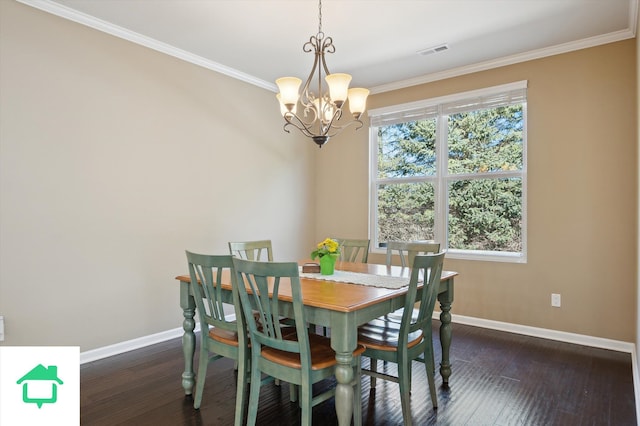 dining space featuring baseboards, visible vents, wood-type flooring, and ornamental molding