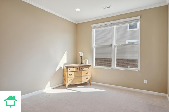 interior space with carpet flooring, baseboards, and ornamental molding