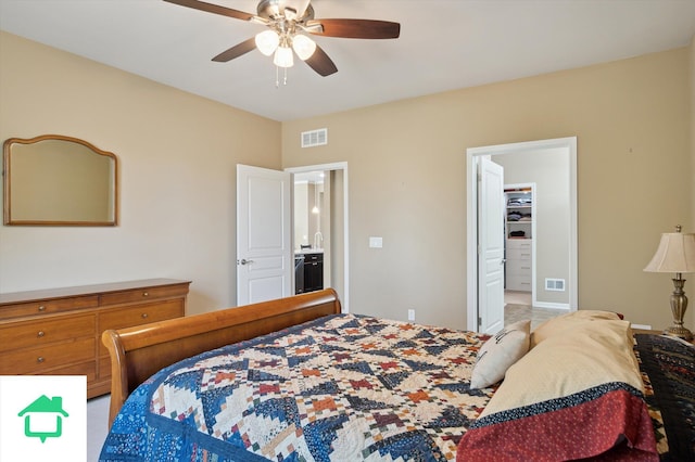 bedroom with visible vents and a ceiling fan