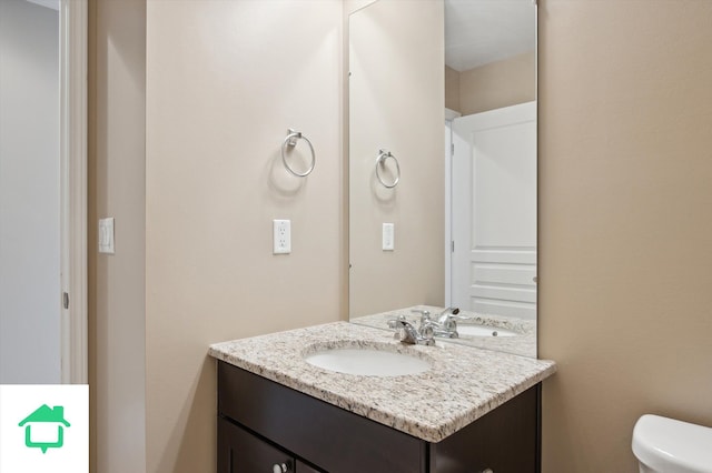 half bath with toilet and vanity