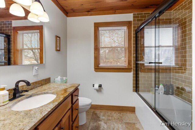 bathroom featuring baseboards, toilet, wood ceiling, enclosed tub / shower combo, and vanity