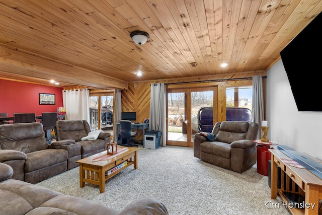 carpeted living room featuring wood ceiling, a wealth of natural light, and recessed lighting