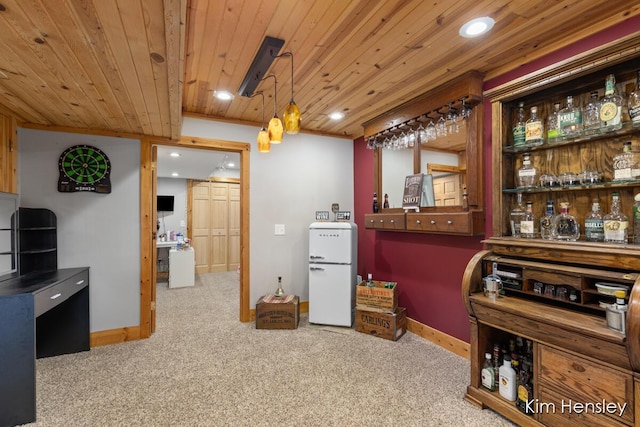 kitchen with baseboards, wooden ceiling, freestanding refrigerator, carpet, and recessed lighting