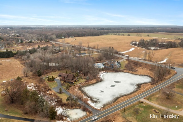 birds eye view of property featuring a rural view