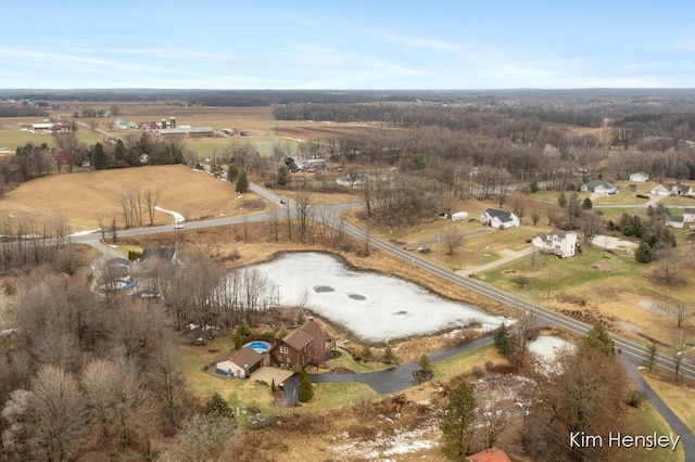 birds eye view of property featuring a rural view