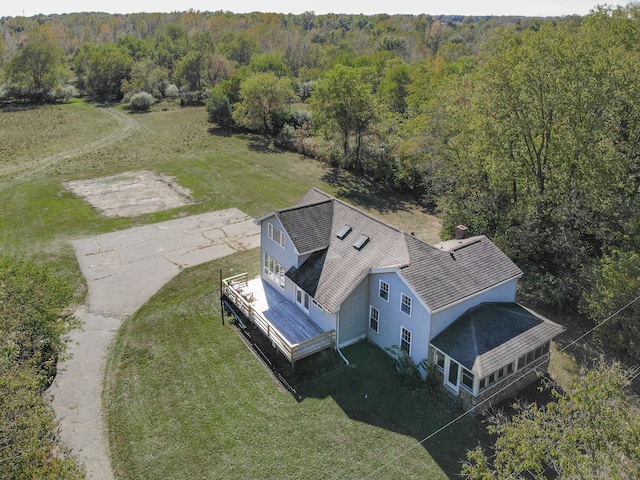 bird's eye view featuring a view of trees