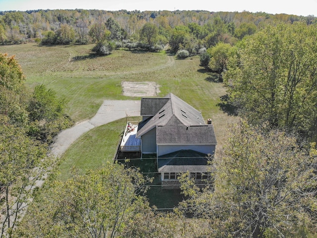 aerial view featuring a forest view