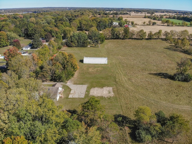 birds eye view of property featuring a rural view