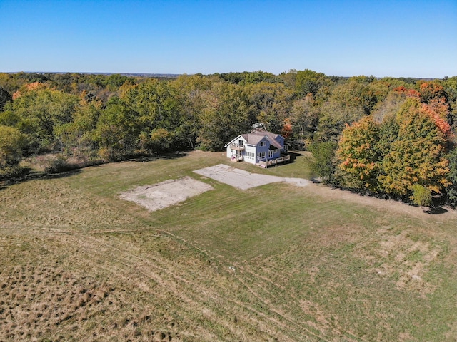 aerial view featuring a view of trees