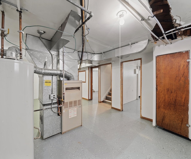 unfinished below grade area featuring water heater, stairs, and baseboards