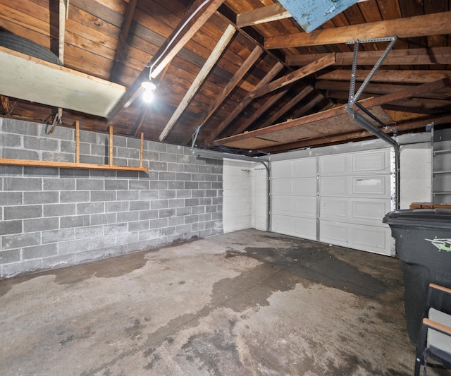 garage featuring concrete block wall