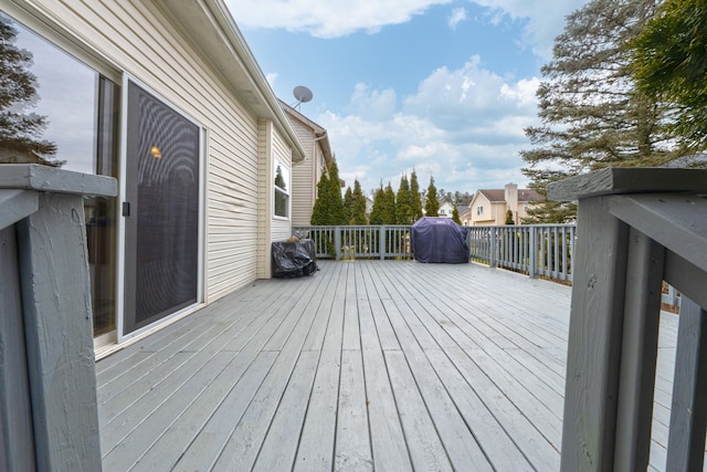 wooden terrace with grilling area