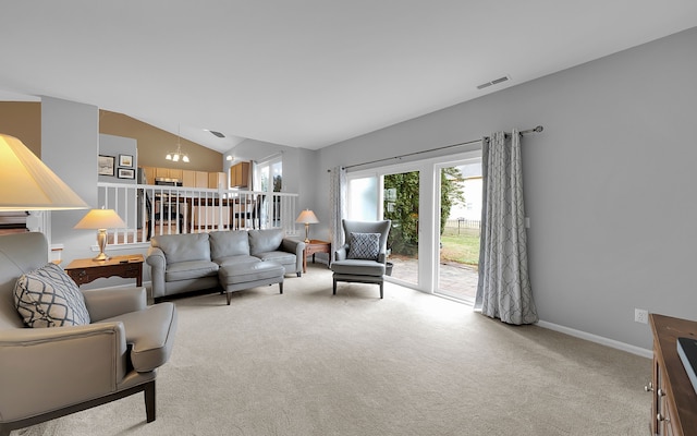 living area featuring visible vents, baseboards, a chandelier, light colored carpet, and lofted ceiling