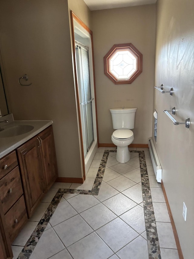 bathroom with a baseboard radiator, toilet, baseboards, tile patterned floors, and a stall shower