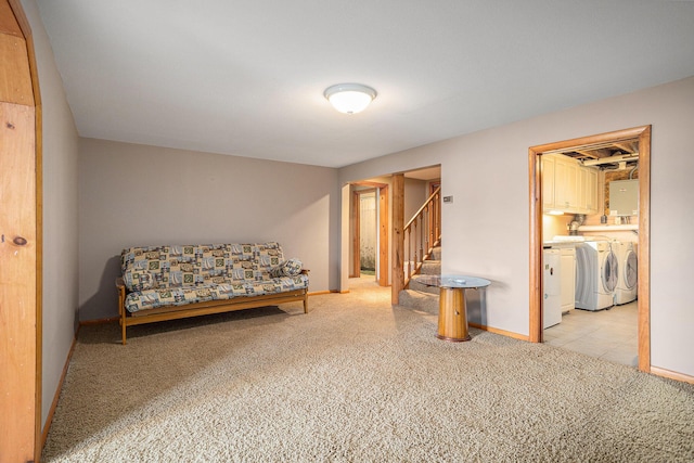 222 Crockett Dr, Quincy, MI 49082 - living area with separate washer and dryer, carpet flooring, and stairs