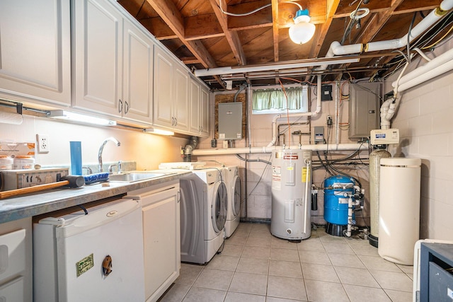 222 Crockett Dr, Quincy, MI 49082 - laundry area featuring water heater, independent washer and dryer, cabinet space, and electric panel