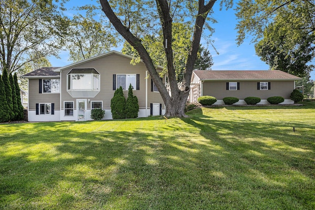 222 Crockett Dr, Quincy, MI 49082 - view of front of house featuring a front yard