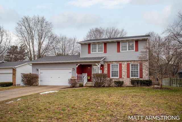 traditional home with an attached garage, brick siding, fence, driveway, and a front yard