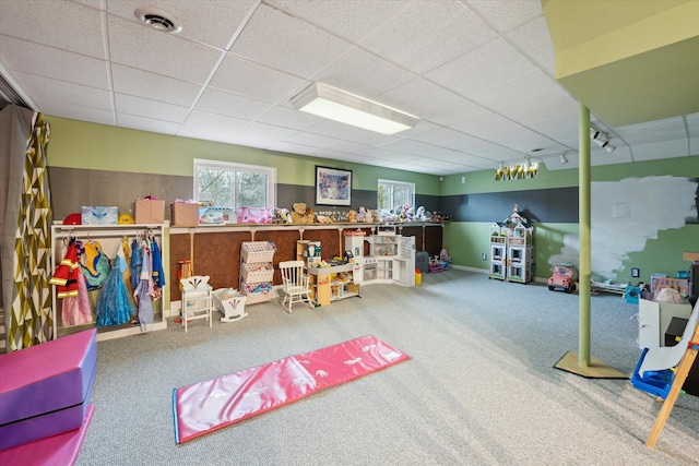 rec room featuring visible vents, carpet flooring, and a drop ceiling