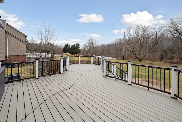 wooden terrace with a yard